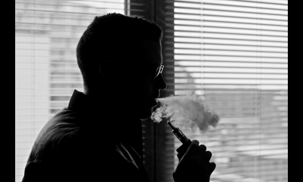 Vaping Man With Electronic Cigarette / E Cig / Vapouriser | ecigclick.co.uk