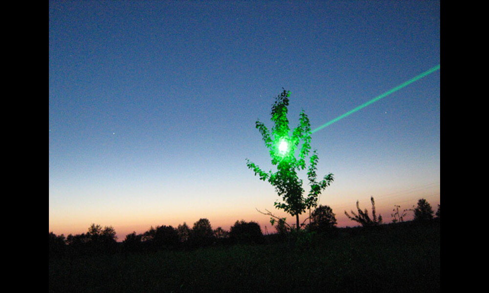 Green laser VS small tree | Helmuts Rudzītis on Flickr